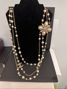 CHANEL Gold Tone Pearl Multi-Strand Necklace with Floral Medallion